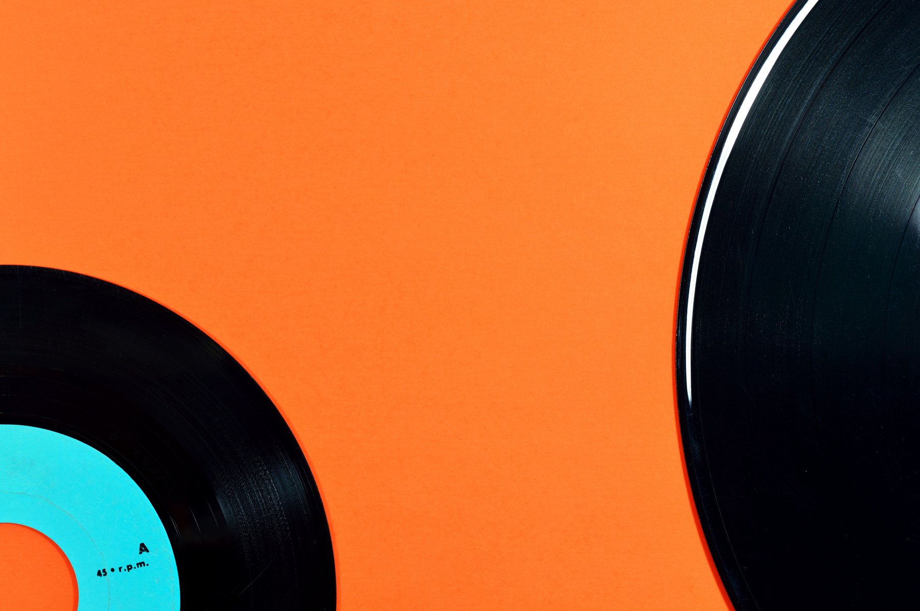 Orange Background with Retro Vinyls